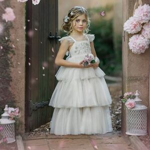 Elegant White Tiered Flower Girl Dress. DOLLCAKE FEATHERED FRIEND FROCK IVORY